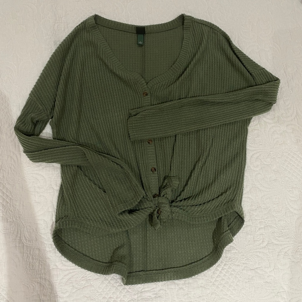 Green tie sweater